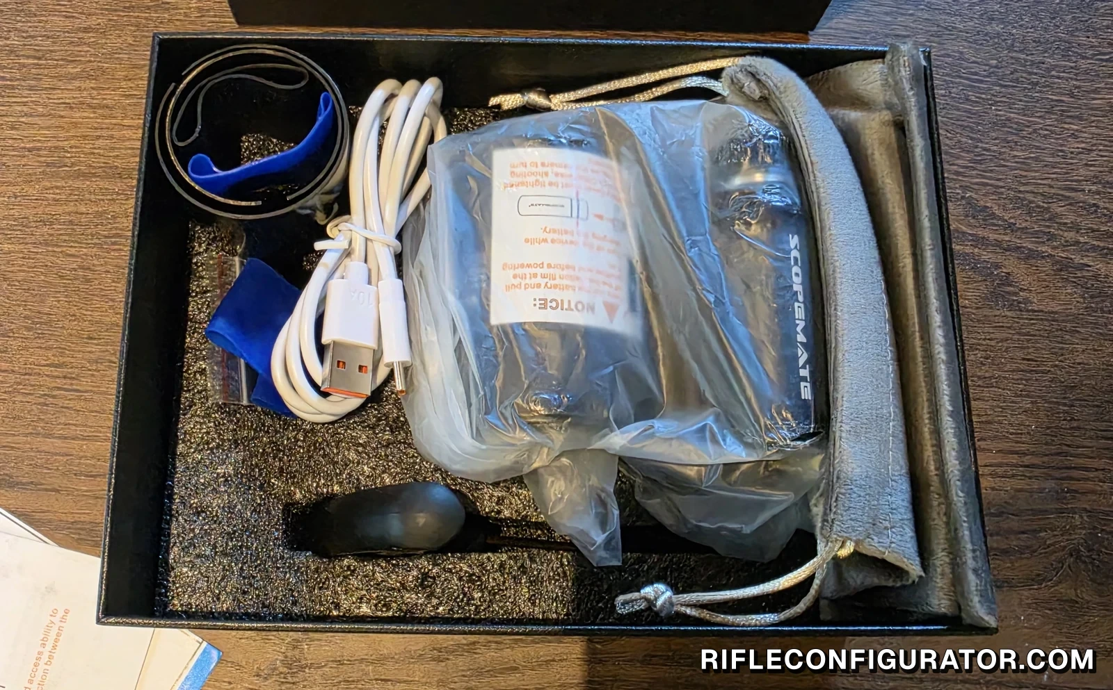 ScopeMate S28-TSC Max box opened: the camera in its wrapping, USB-C cable, adapter inserts and rubber bands, T-handle hex key, and a drawstring bag
