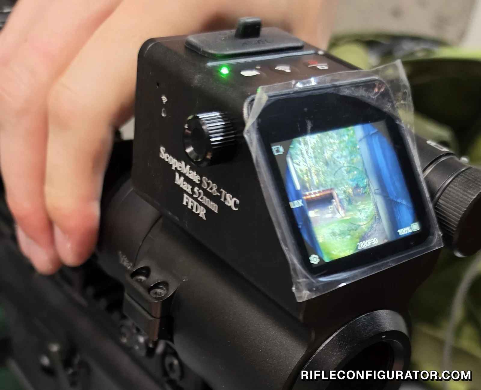ScopeMate S28-TSC Max FFDR mounted on the eyepiece of a scope on an LWRC rifle