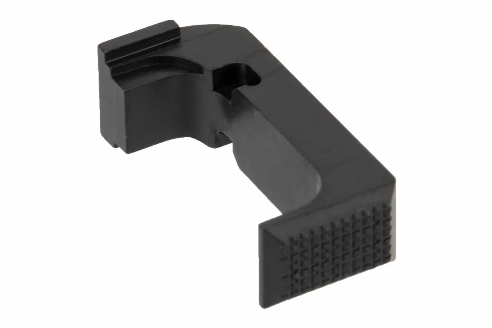 A steel Glock magazine catch with a checkered release pad on a white background