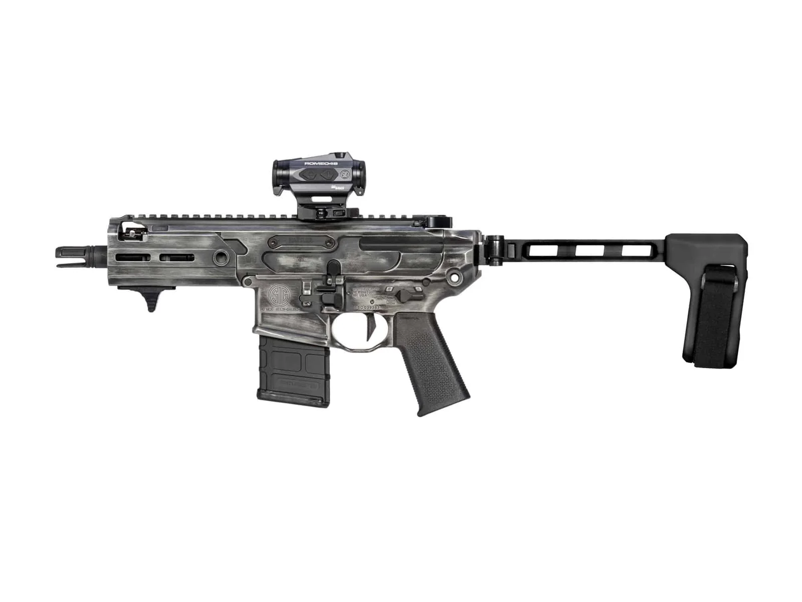 An AR-pattern 9mm pistol with an SB Tactical pistol brace mounted on a 1913 Picatinny rear rail, illustrating the brace interface the SMC Bravo provides