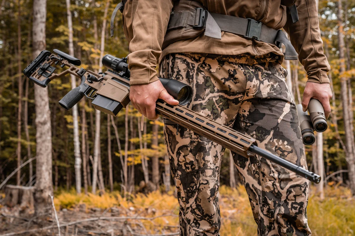 SIG Sauer Cross precision rifle with stock folded, showing the compact pack-friendly footprint