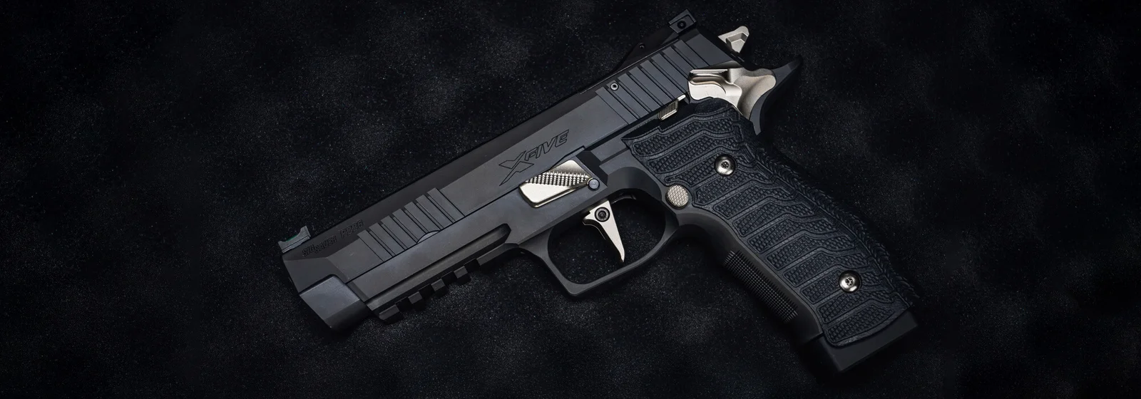 SIG P226-XFIVE Nightmare pistol showing E-Nickel controls, fiber optic front sight, flat trigger, and G10 grips