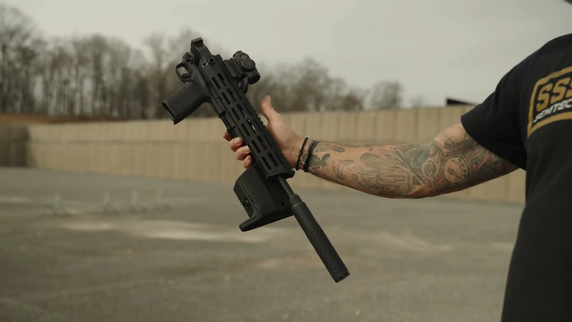 Smith & Wesson M&P FPC 5.7 folding pistol carbine with Gemtech Nebula suppressor in folded configuration