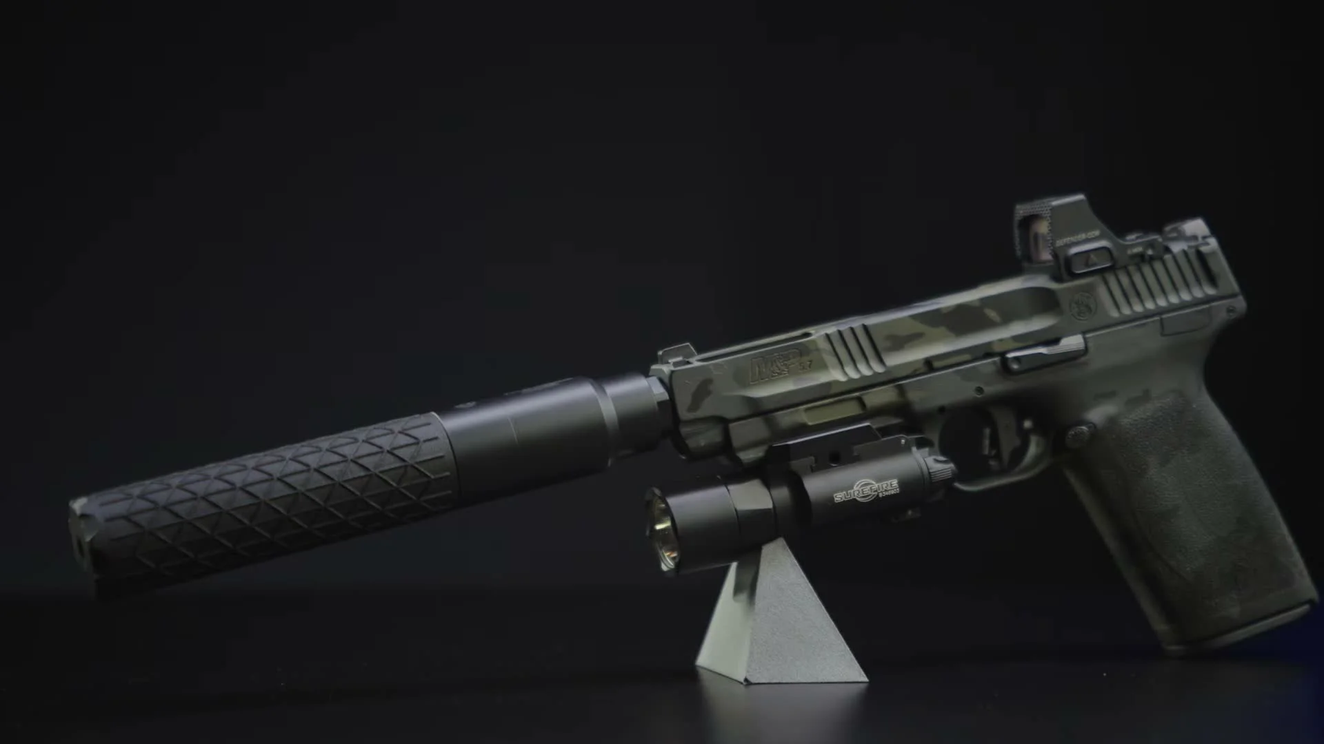 Smith & Wesson M&P 5.7 pistol with Gemtech Nebula 5.7 suppressor and SureFire weapon light