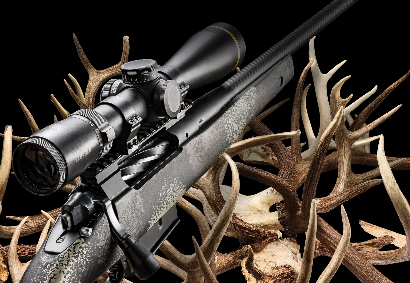 Springfield Model 2020 Waypoint receiver and fluted bolt with a carbon fiber barrel and Leupold scope, staged on shed antlers