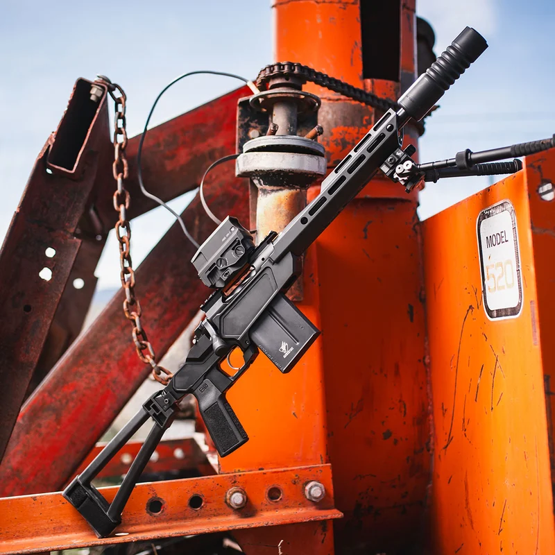 Front half of the Springfield Heatseeker pistol showing the 12 inch stainless barrel, extensive M-LOK handguard, and the factory SA Radial Brake with 5/8x24 threads