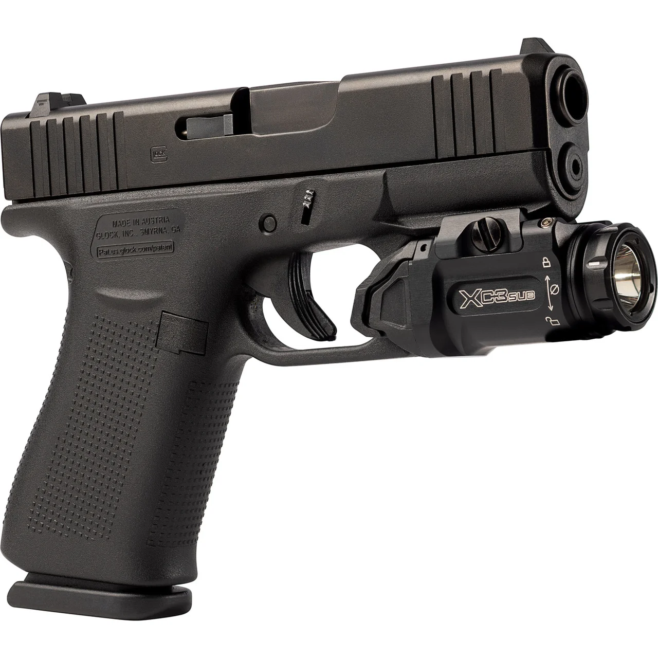 Studio photo of a black SureFire XC3 Sub weapon light mounted on the abbreviated rail of a slimline Glock pistol, with the XC3 SUB rollmark visible on the light body