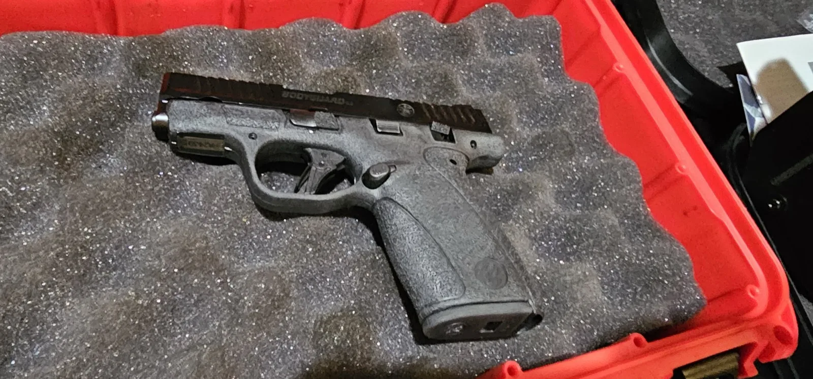 Left-profile view of the Smith & Wesson Bodyguard 2.0 .380 showing its flat-face trigger and M&P-style grip texture