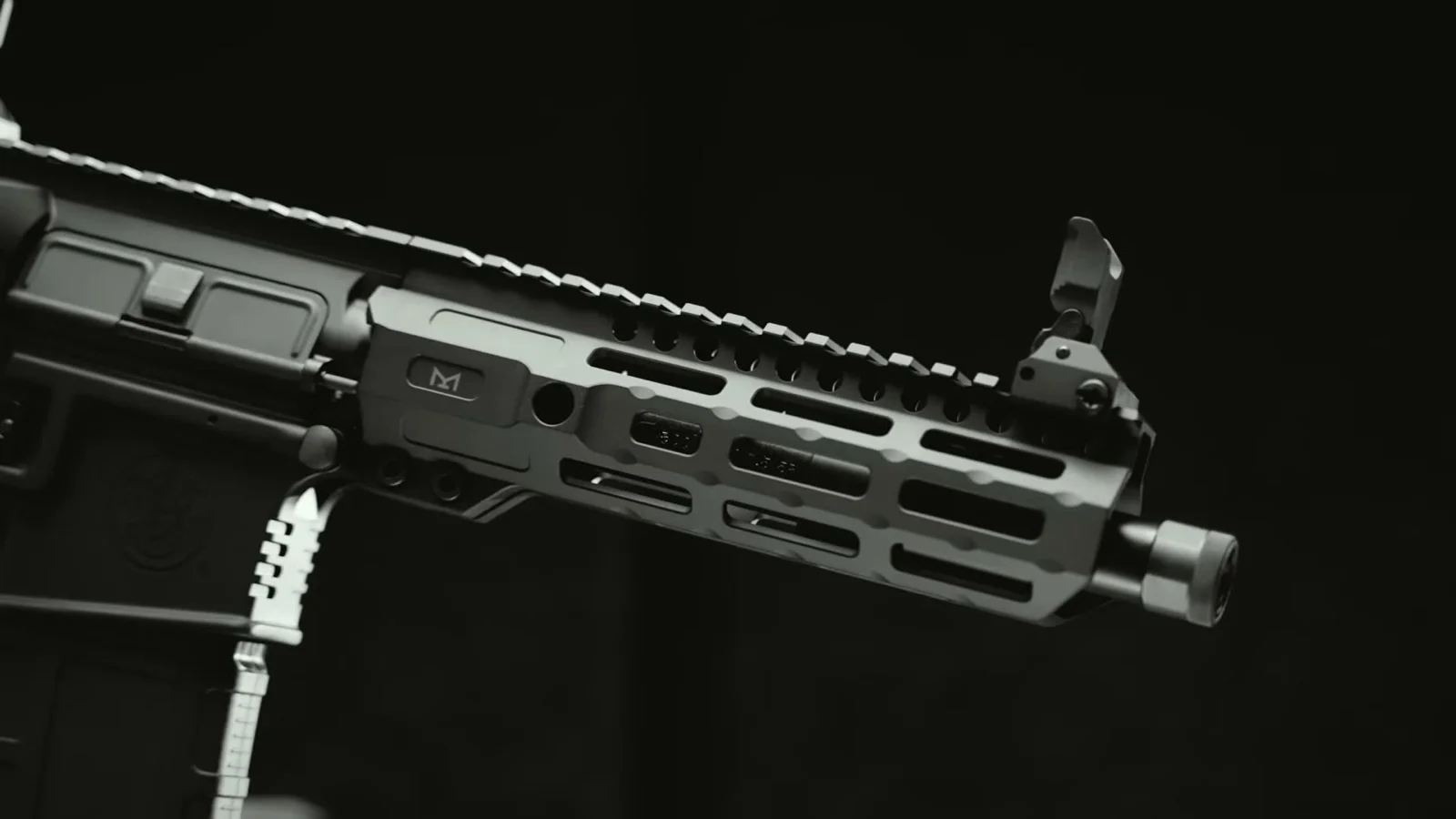 Close-up of the Midwest Industries seven-sided M-LOK handguard and top rail on the M&P15 AXE .300 Blackout