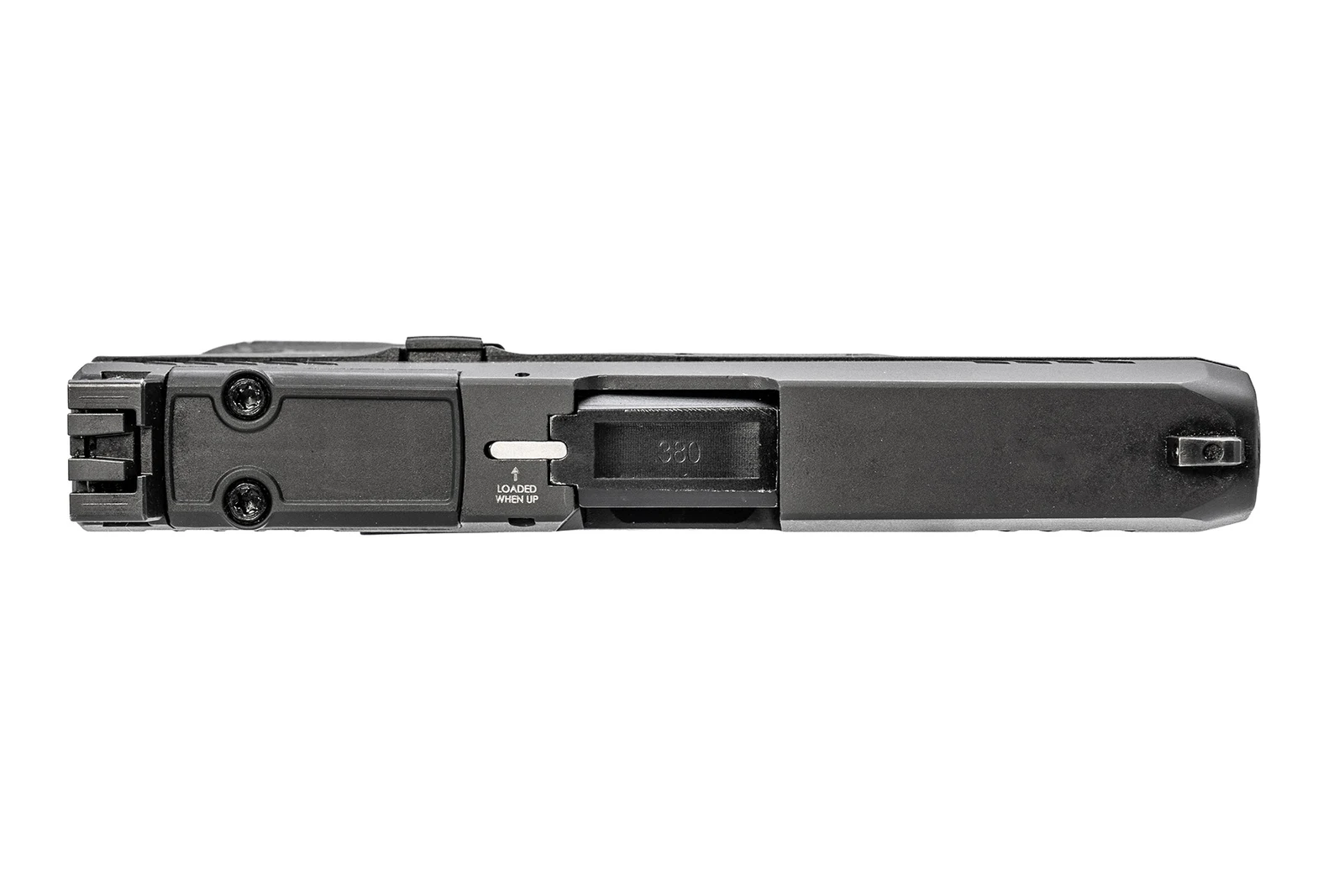 Top-down view of the Taurus GX4 Carry .380 Auto showing the two-screw T.O.R.O. optic cover plate, the LOADED WHEN UP chamber indicator, and the 380 caliber marking on the barrel hood