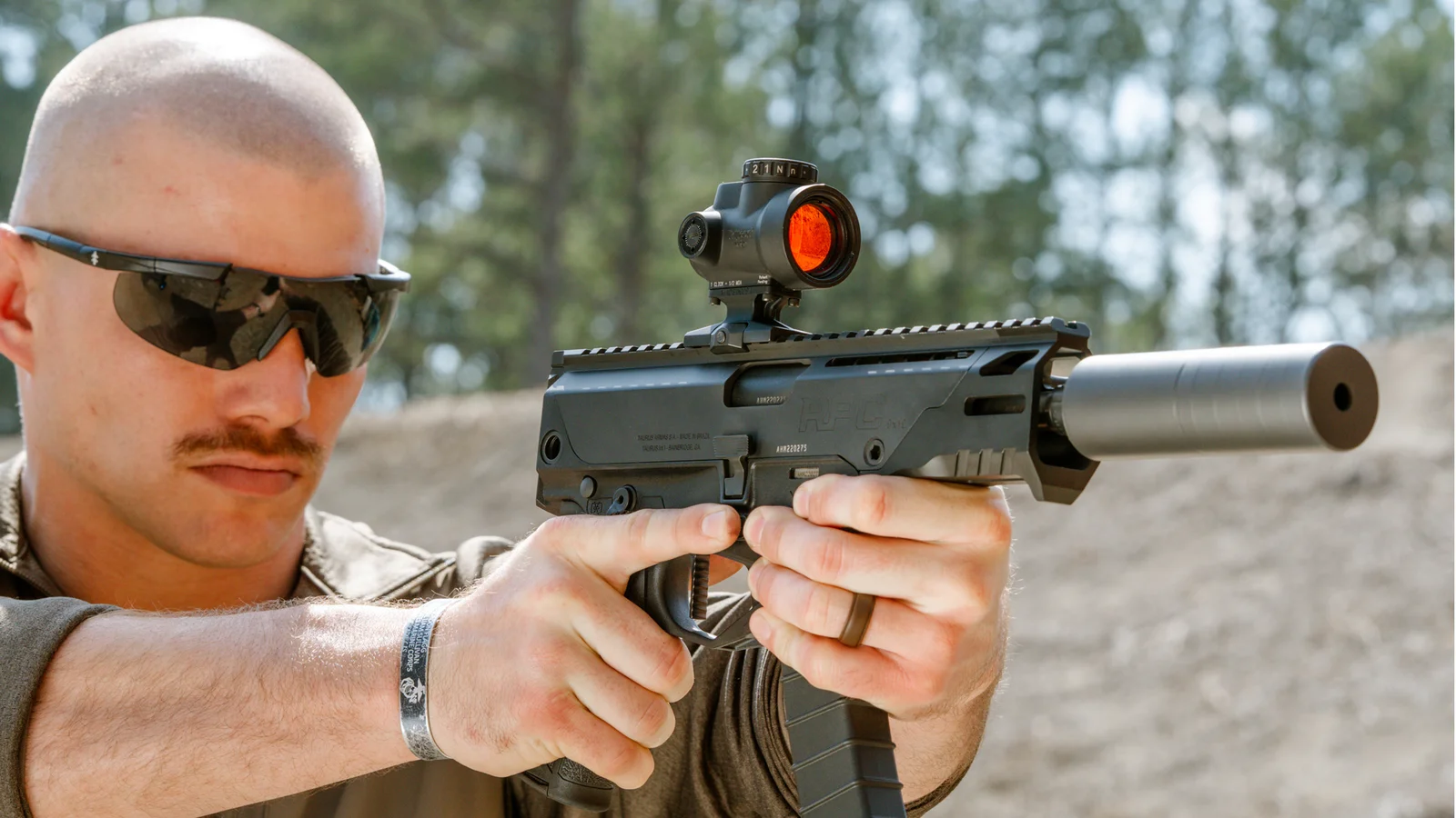 Taurus RPC 9mm PDW being fired at the range, showing the flat-tracking roller-delayed action