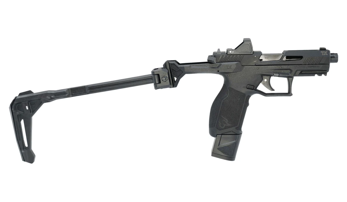 Taurus TX22 With Brace with the Strike Industries FSA Lite extended and a red dot on the slide