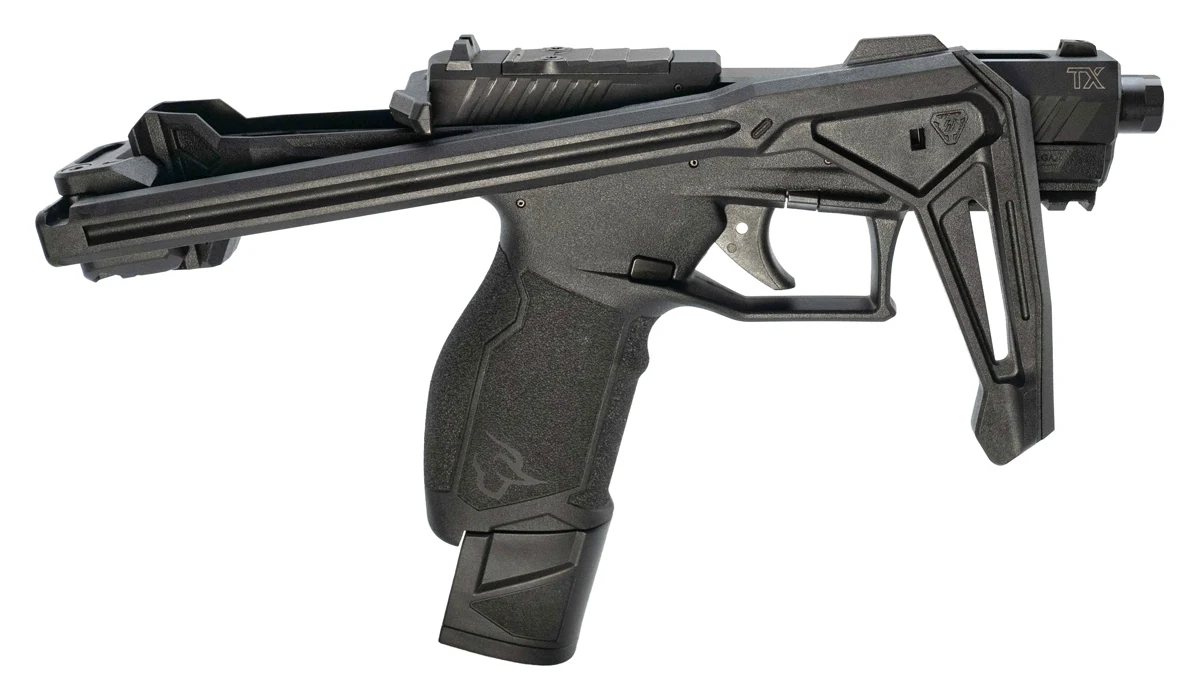 Taurus TX22 With Brace with the Strike Industries FSA Lite folded along the left side of the frame