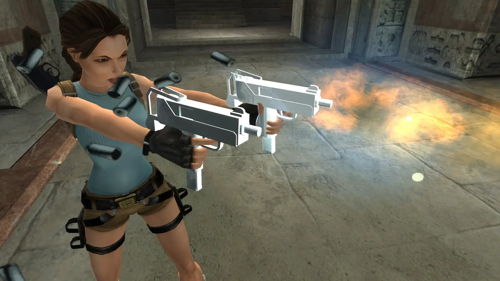 Lara Croft firing the unlockable Silver Mini SMGs in Tomb Raider Anniversary