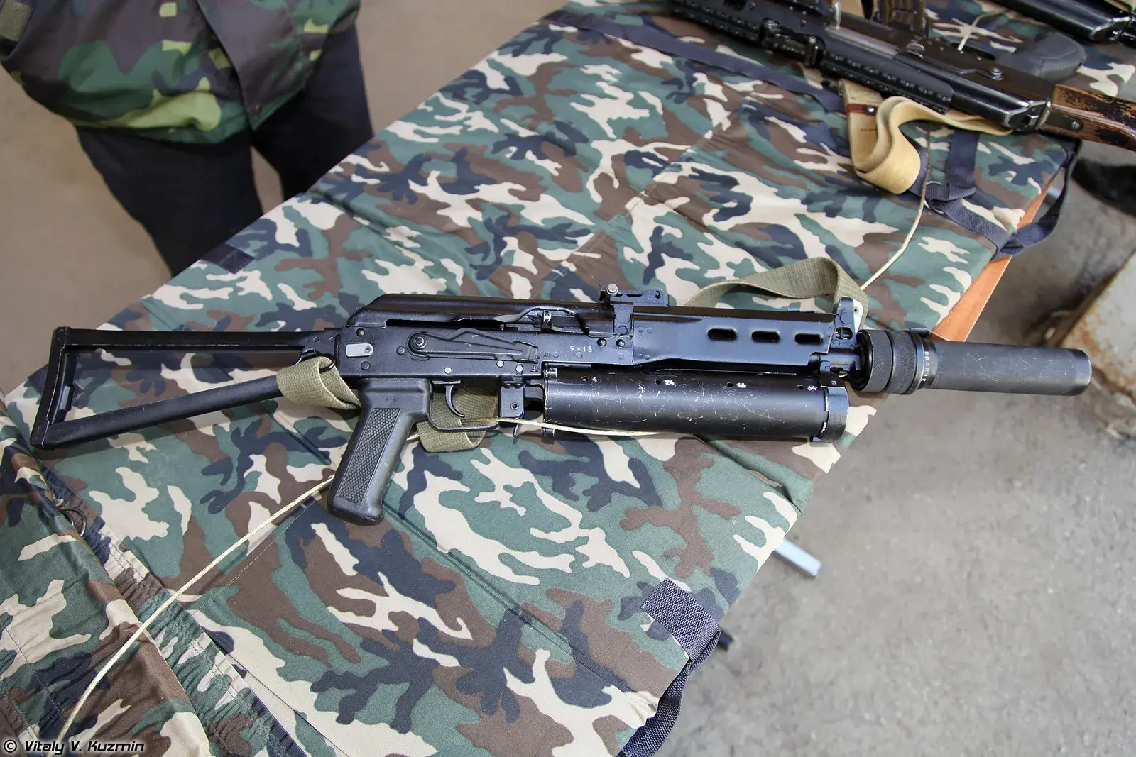 PP-19 Bizon submachine guns displayed on a table