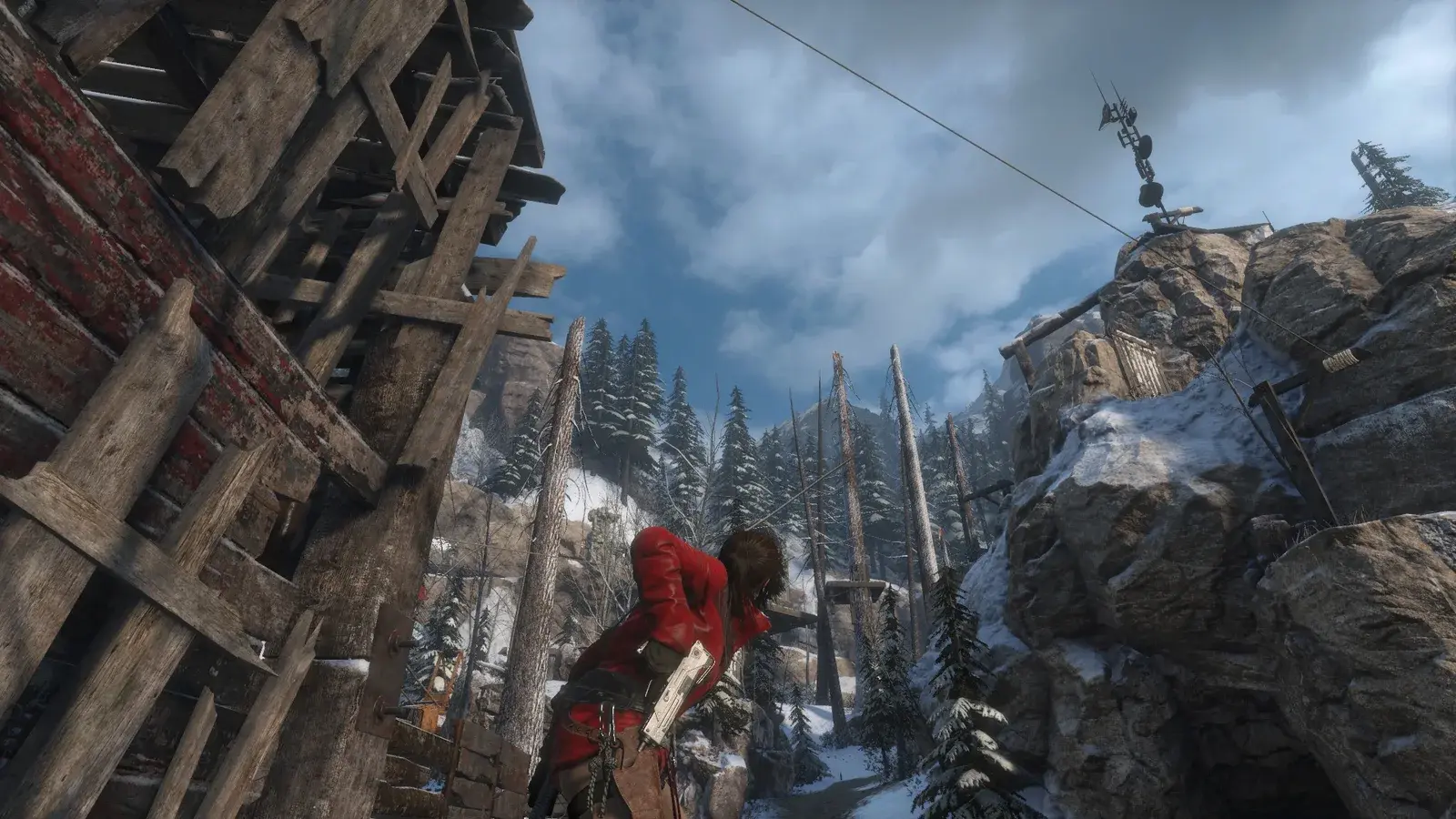 Lara holding the Hailstorm machine pistol in Rise of the Tomb Raider
