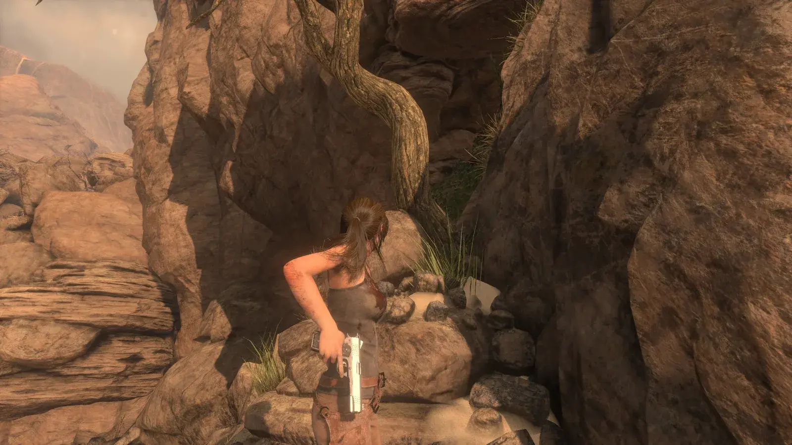 Lara holding the Semi-Auto Pistol in Rise of the Tomb Raider