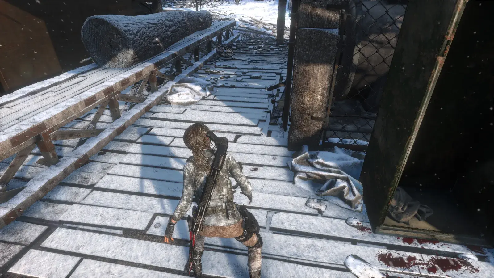 Lara holding the Tactical Shotgun in Rise of the Tomb Raider