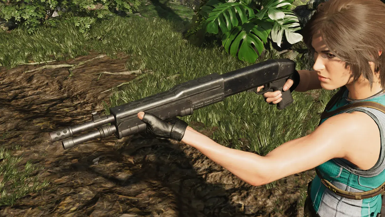 Lara holding the TAEV 16 in Shadow of the Tomb Raider