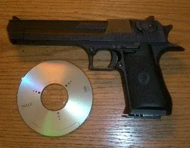 A 357 Magnum Desert Eagle shown as a family comparison for Tomb Raider's Magnums