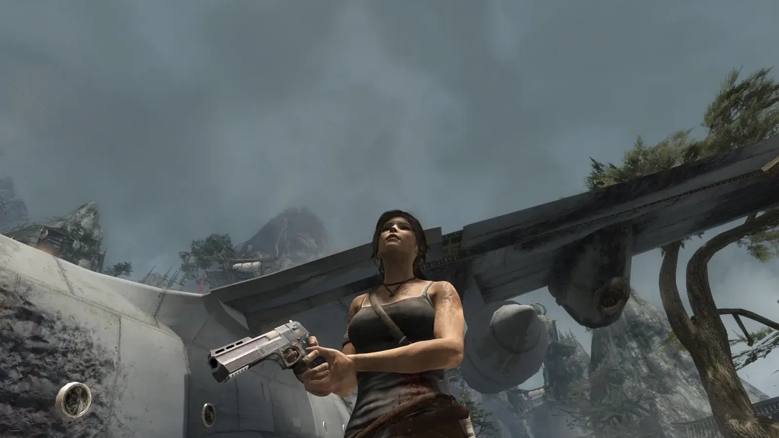 Lara holding the Magnum Pistol in Tomb Raider 2013