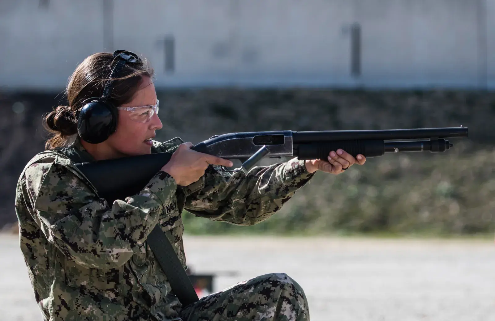 A real Mossberg 500 shotgun being fired