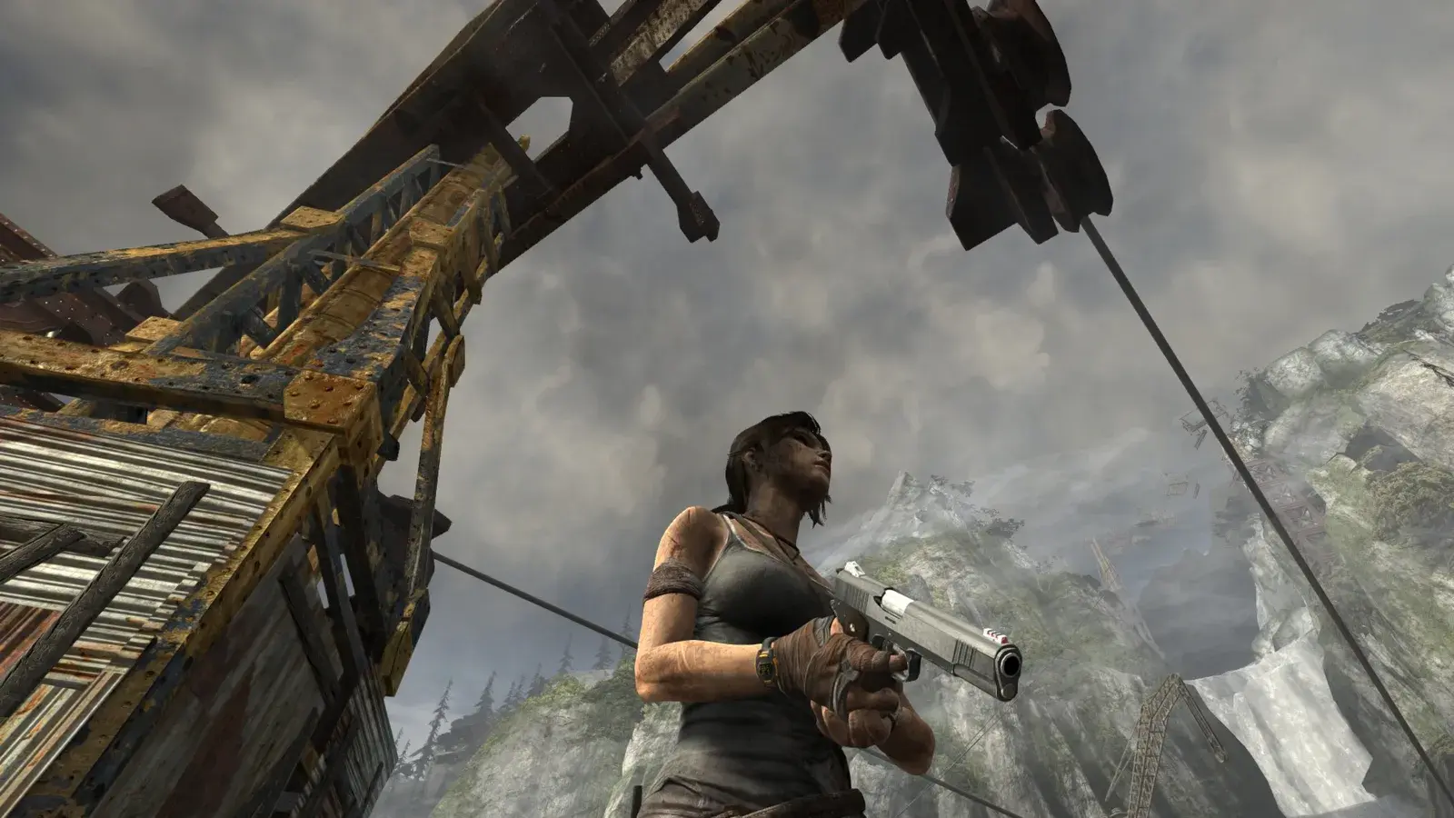 Lara holding the Tactical Pistol in Tomb Raider 2013