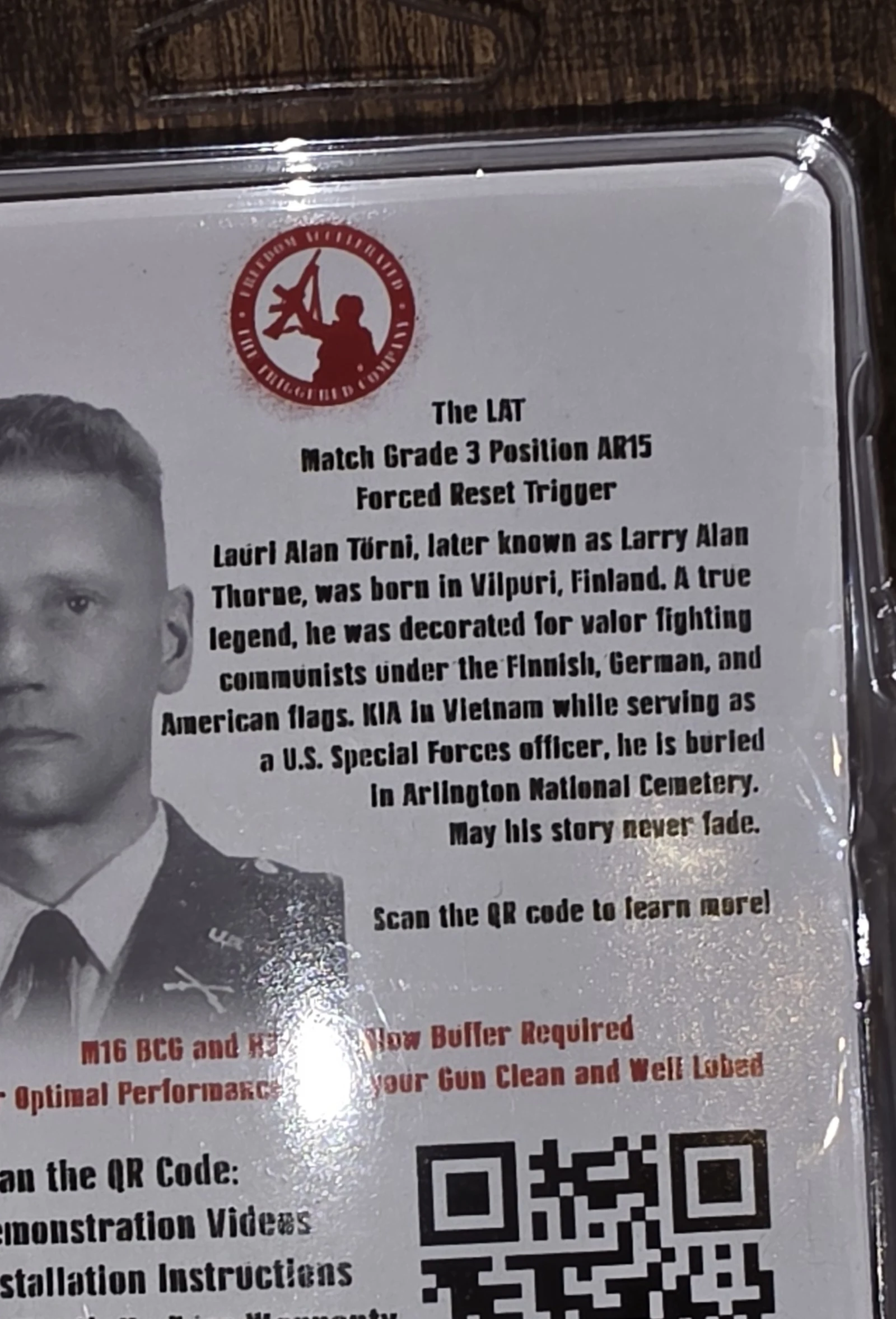 Back of the LAT packaging with the Larry Alan Thorne biography, buffer and BCG requirements, and 12-month warranty