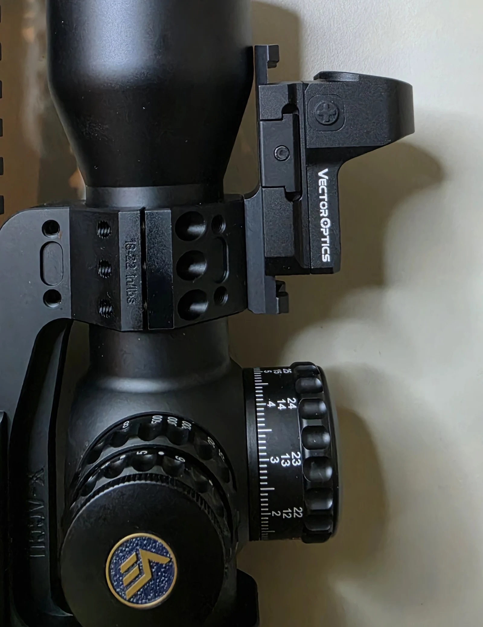 Vector Optics Frenzy FM red dot mounted at 45 degrees on a short Picatinny rail attached to the X-ACCU scope ring of the Continental 2-12x44