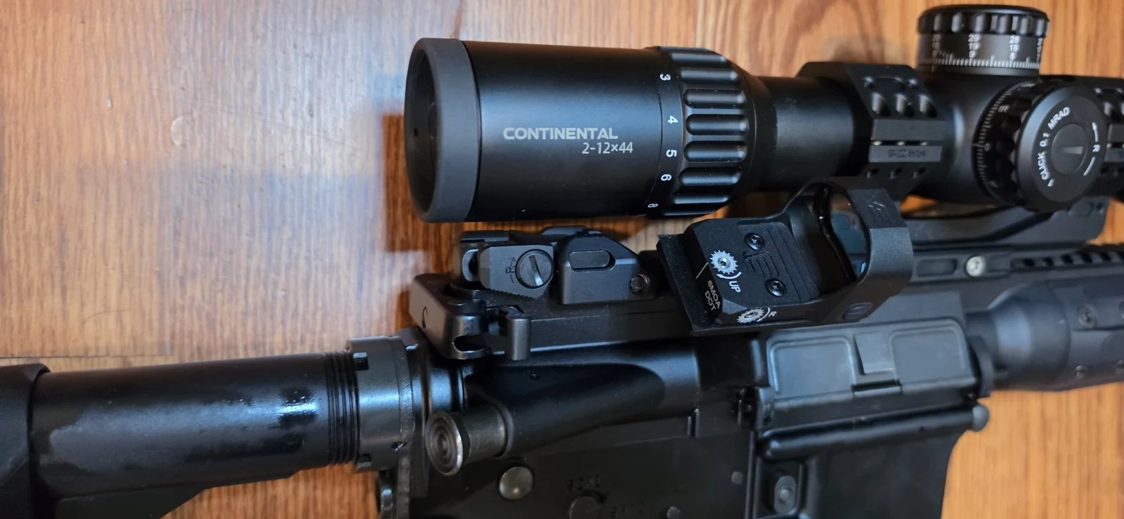 The Vector Optics Frenzy FM red dot marked 6MOA DOT on a 45-degree offset mount beside the Continental 2-12x44 scope tube