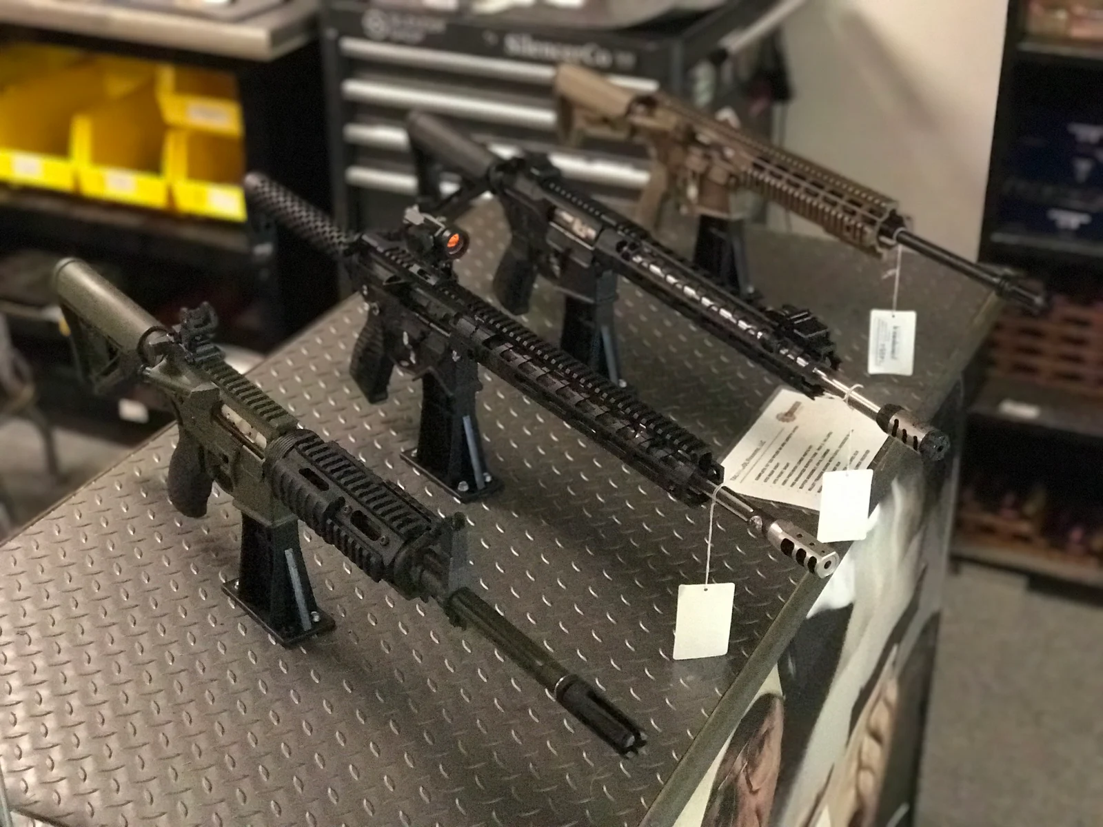 Virginia gun store display case with AR-15 rifles
