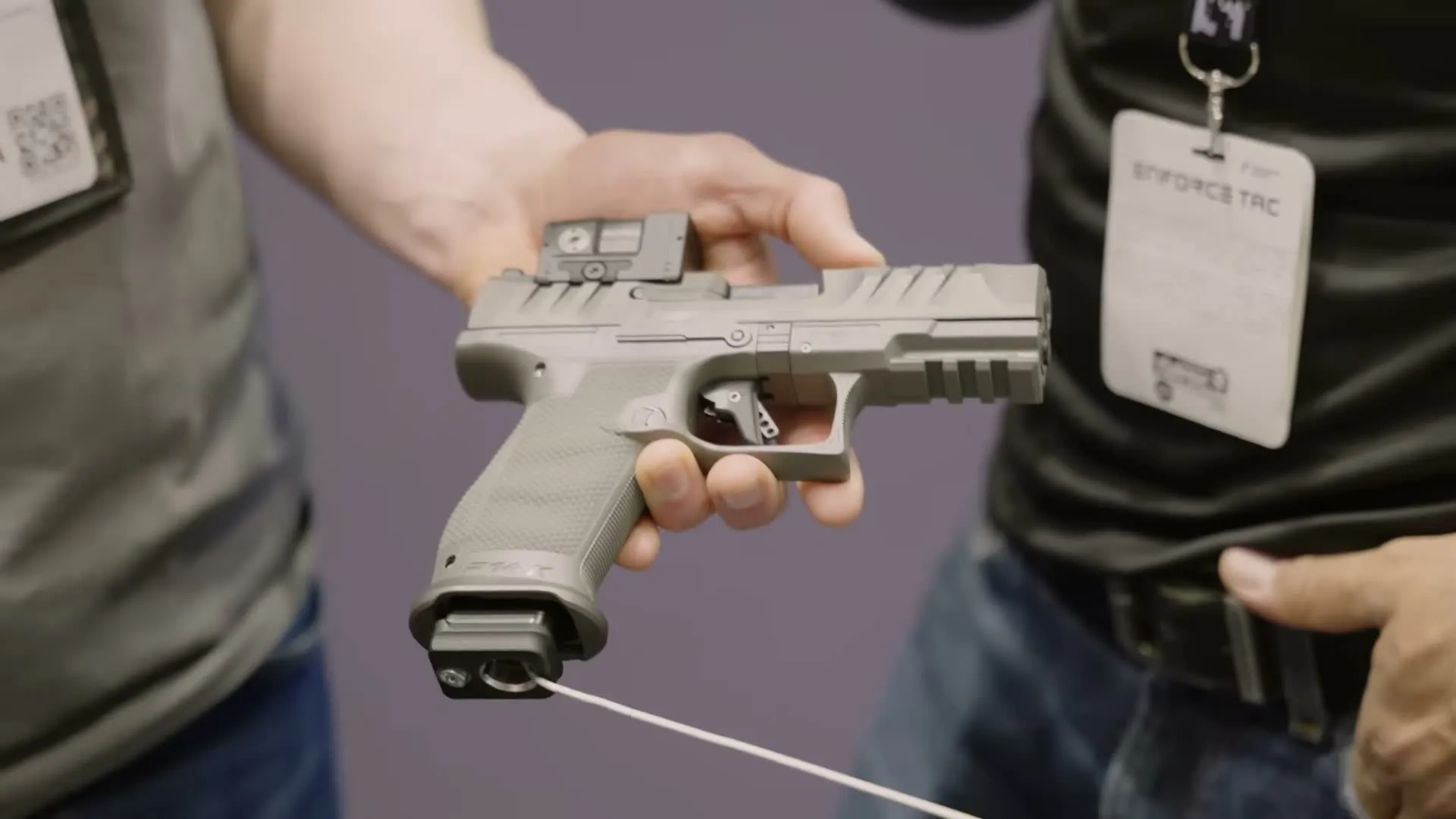 Walther P14K compact variant in grey finish showing shortened barrel and grip compared to the full-size P14