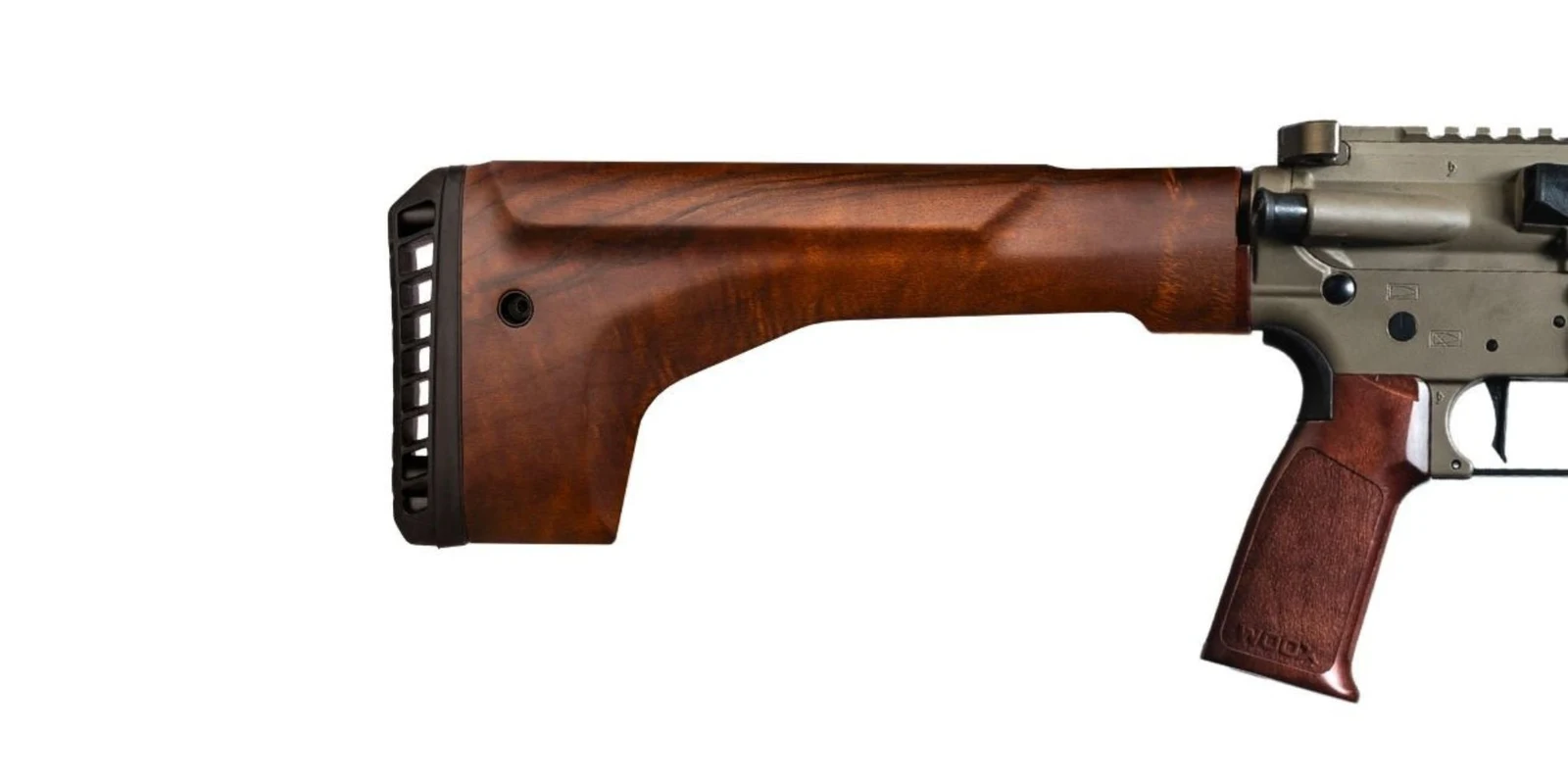 WOOX Vigilante Fixed Stock in walnut mounted on an FDE AR-15 lower receiver with a matching wood pistol grip