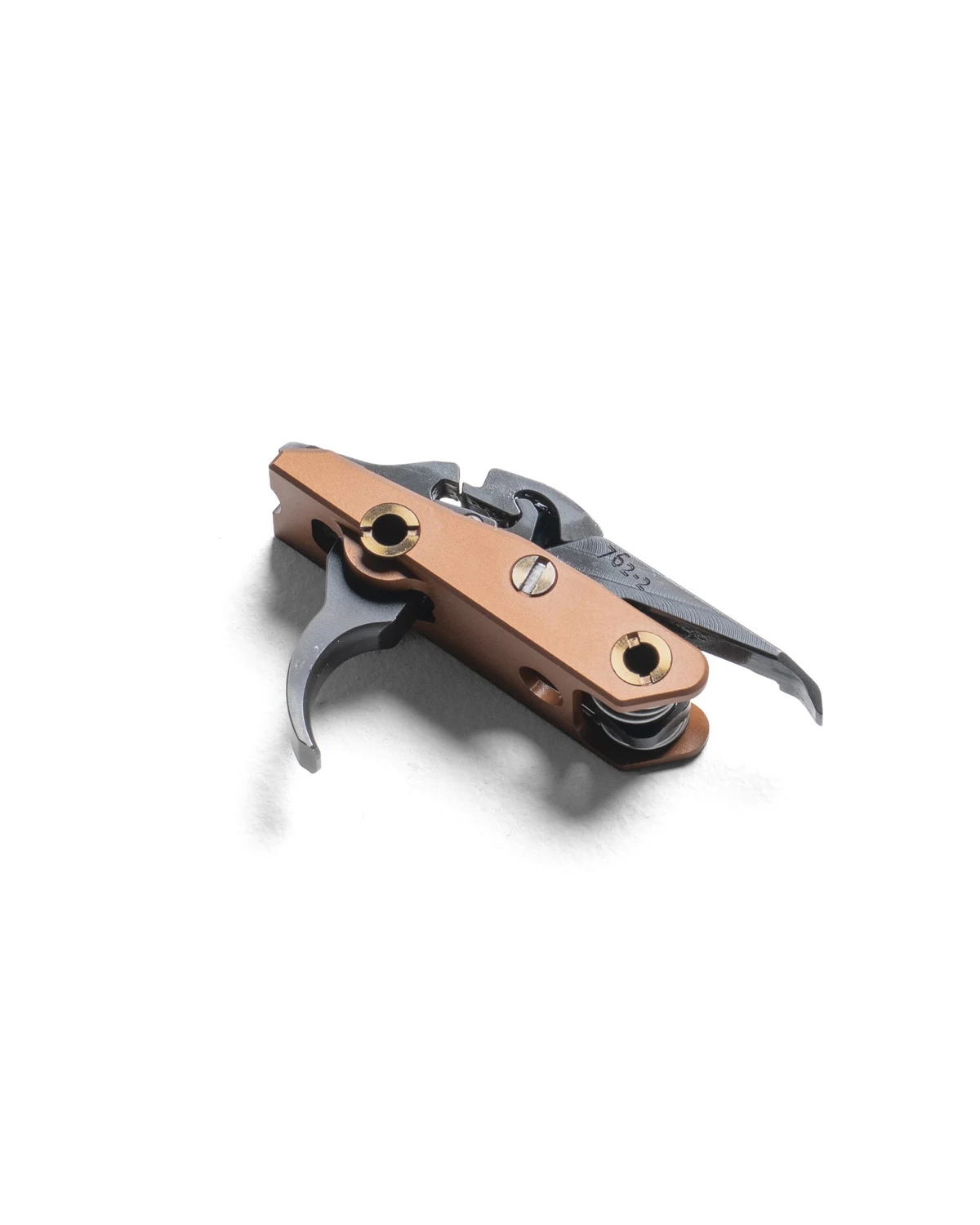The Wrangeler AK assisted reset trigger cassette with copper-colored side plate, shown from the front three-quarter angle